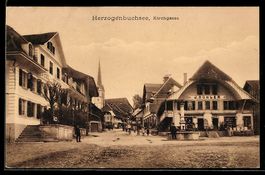 AK Herzogenbuchsee, Kirchgasse mit Geschäft von J. Bühler un
