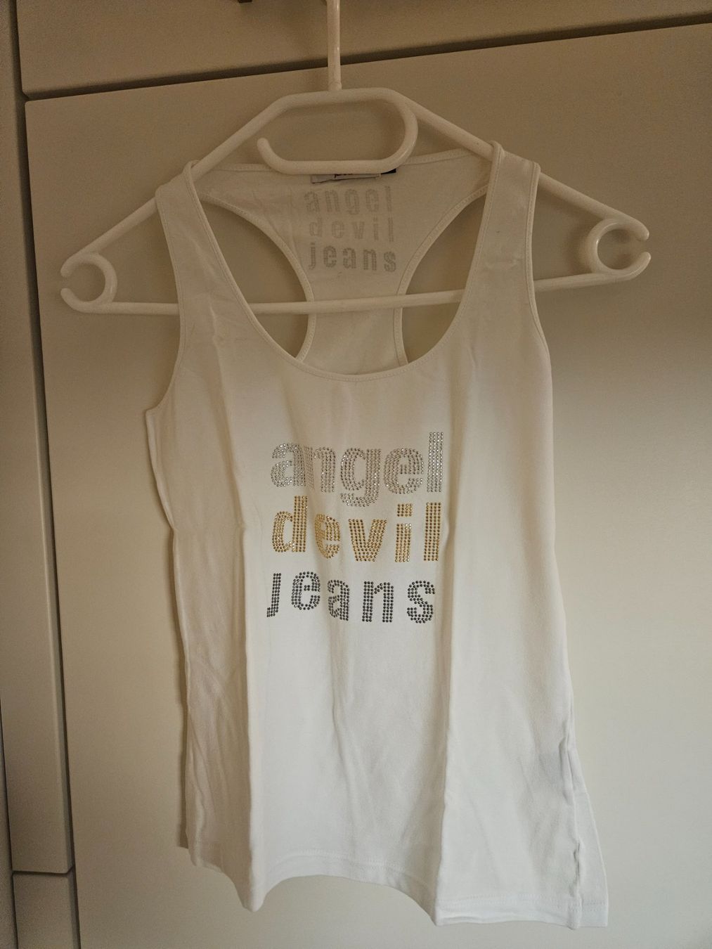 Tops: Angel Devil Jeans Top Weiss Gr. M – Gebraucht aus Luzern von Staenker