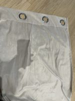 Un rideau gris clair effet daim 1m40 largeur et 2m28 hauteur