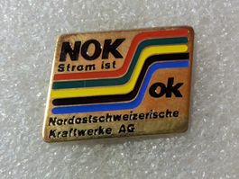 Ansteckpin 124: Nok