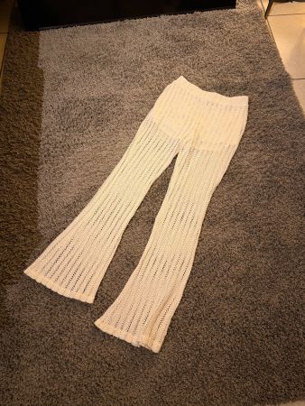 Pantalon en maille crochet couleur crème d'occasion