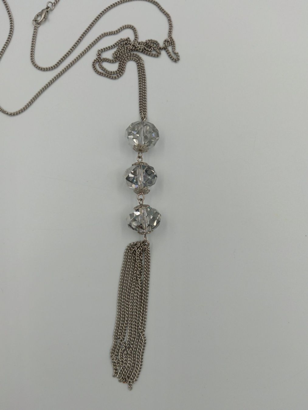 Colliers: Lange Modeschmuck-Halskette, silberfarben mit Quaste – Neuf avec emballage d'origine à Bäch SZ par Swissy46 2