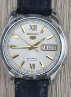 Seiko 5 D/D Auto with white dial and gold markers.Dec 2011.