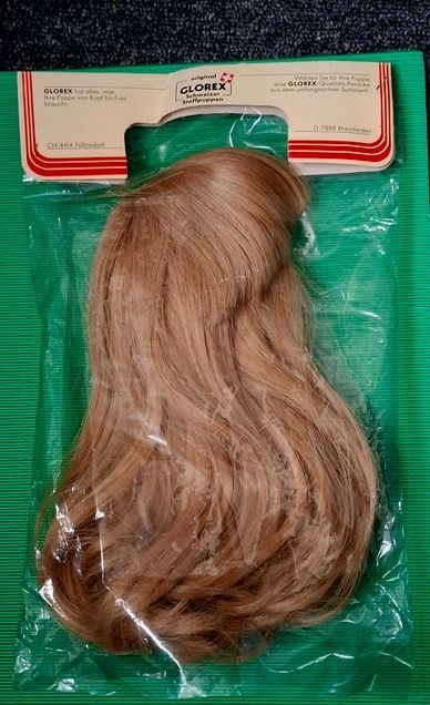 Glorex Bambole: 3 Echthaar Glorex Puppenperücken Originalverpackt. – Nuovo e nell'imballaggio originale da Basel venduto da Batzelaibli 7