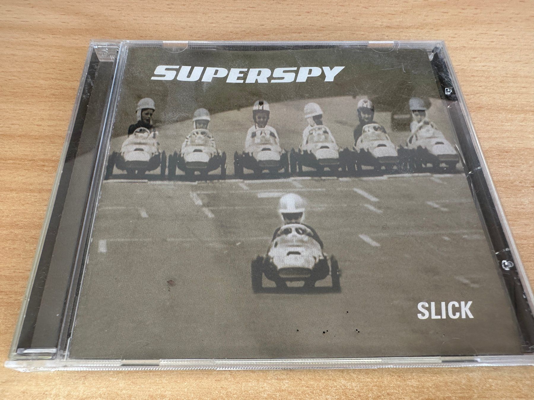 CD: M1 Superspy – Slick – Usato da Rikon im Tösstal venduto da Alpenmutz