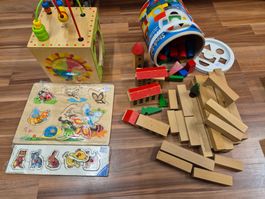 Motoeik und Puzzles oder Holzbausteine B2