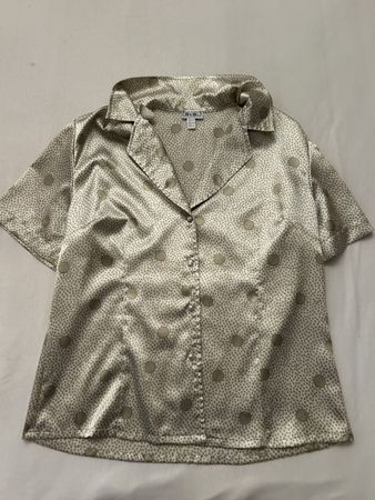 Vintage satin blouse with pearl-style buttons.
