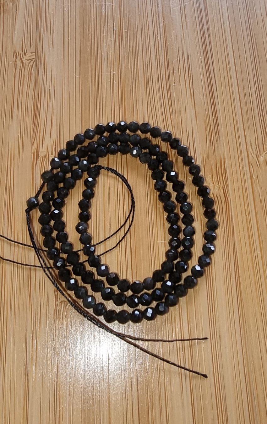 Minerali & Pietre curative: Obsidian facettiert 3mm. Strang – Nuovo e nell'imballaggio originale da Menziken venduto da Mirager 1