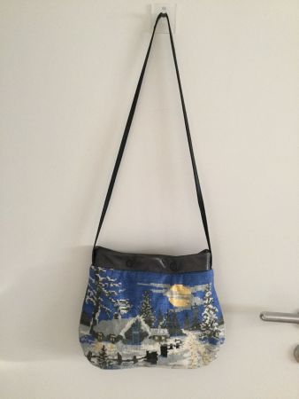 Unique Klein Tasche