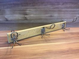 Coole Kleiderhakenleiste, Wandgarderobe mit Fratzen