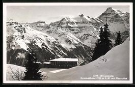 AK Ortstockhaus mit Hausstock im Schnee