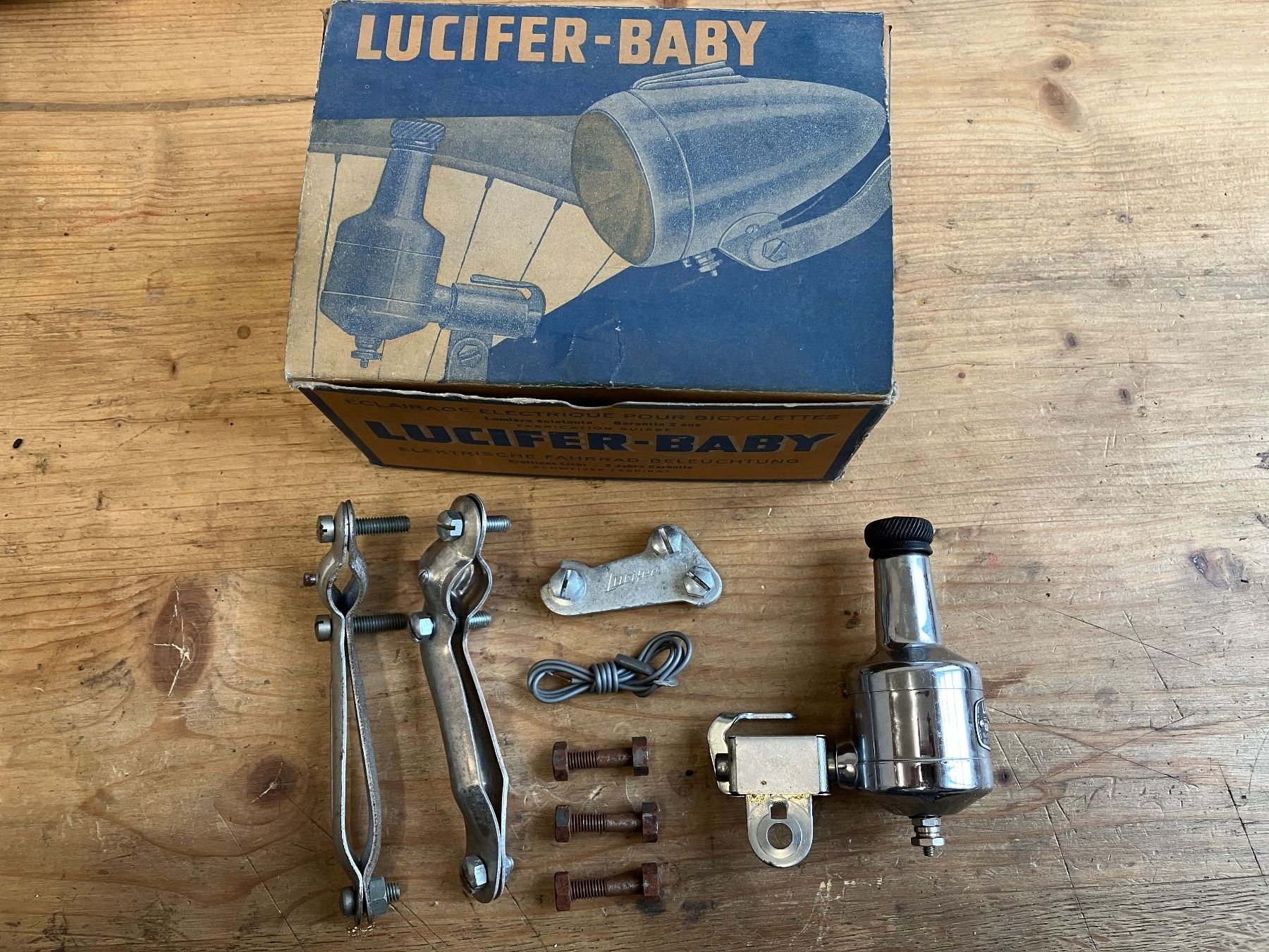 Pezzi di ricambio: NOS Lucifer Baby Dynamo – Nuovo e nell'imballaggio originale da Burgdorf venduto da intact-Velowerkstatt