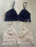 2 Bralettes dunkelblau und rosa Spitzen Grösse L