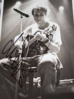 Clueso - Autogramm auf Foto