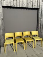Four Yellow Plastic Chairs Used Condition