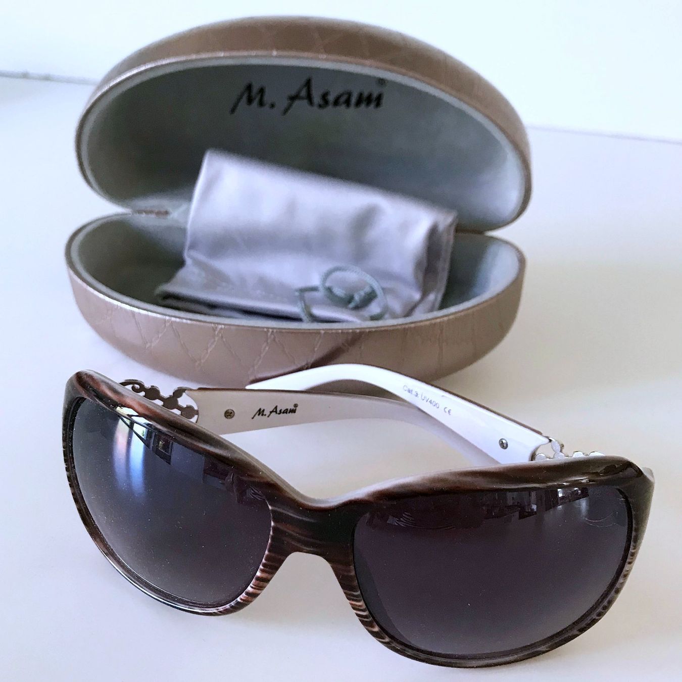 Occhiali & Lenti: Sonnenbrille M. Asani mit Etui – Usato da Brüttisellen venduto da Buxus 1