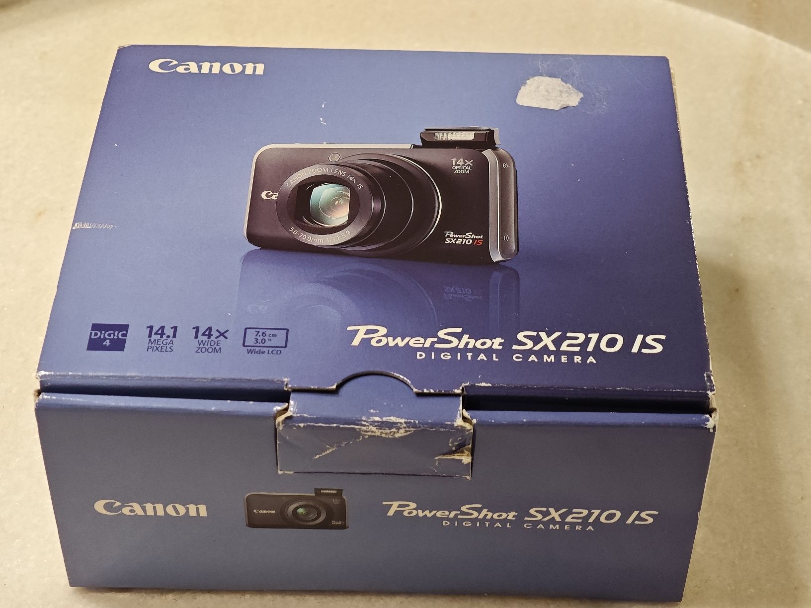 Canon Fotocamera: Canon PowerShot SX210 IS – Nuovo (secondo la descrizione) da Cham venduto da pot_lpv7 8
