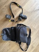 Nikon D3100 + 18–55 mm VR + Tasche + Akku + Ladegerät
