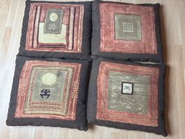 Lot de 4 coussins décoratifs motifs ethniques brun