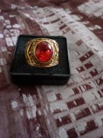 Goldener Ring mit rotem Stein Grösse 66 wie neu!