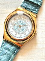 Damenuhr Swatch goldfarben mit grünem Armband gebraucht