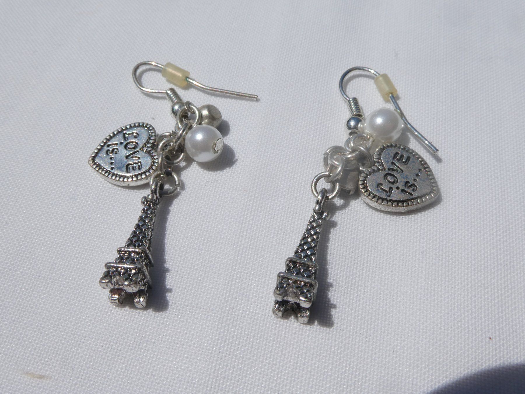 Boucles d'oreille: Ohrhänger 'Love is...', Modeschmuck – D'occasion à Gattikon par kaandooh