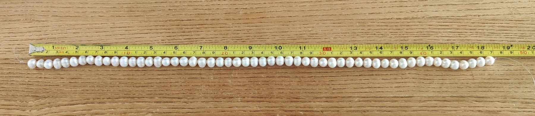 Perle (finte): Süsswasserperle, oval ca. 9x10mm, weiss, 47cm – Nuovo e nell'imballaggio originale da Rümlang venduto da 21f 1
