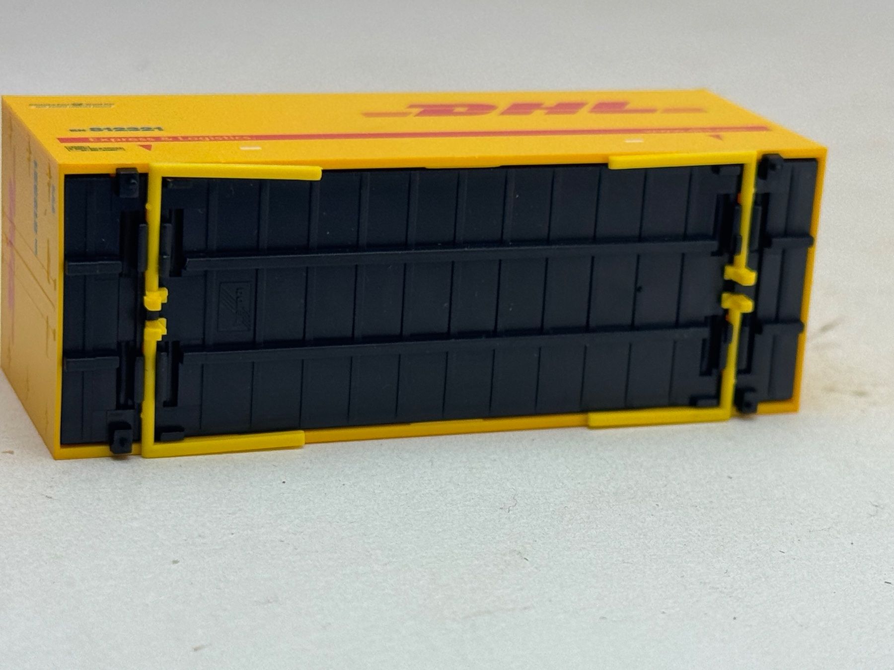 Herpa Modellini d'auto: AU- Herpa DHL Wechselpritsche – Usato da Elm venduto da Wikmtz 2