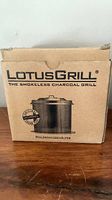 Contenitore carbonella Lotus Grill