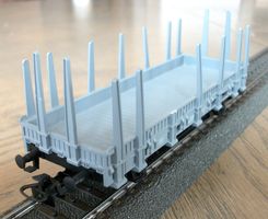 grauer Rungenwagen der SBB