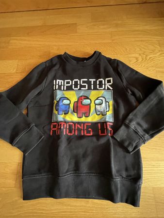 Pullover impostor Among Us  Schwarz Grösse 134-140