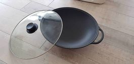Poêle wok en fonte