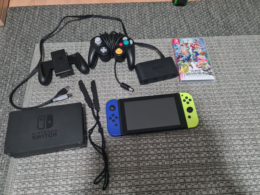 Nintendo Switch plus 4 Spiele und Controller | Kaufen auf Ricardo