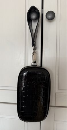 Vintage black clutch with wrist strap, crocodile look