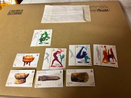 8 tolle Briefmarken Hongkong