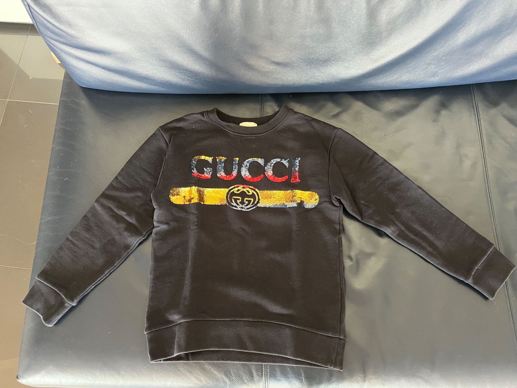 Gucci Pulls & Sweat-shirts: Pull Gucci noir logo paillettes taille enfant – D'occasion à St-Blaise par Yeeppp
