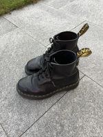 Dr. Martens black leather boots 