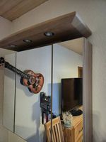 Armoire de salle de bain à portes miroir