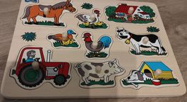 Holzpuzzle Bauernhof: Tiere und Traktor entdecken!