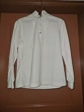 Pile bianco con mezza zip