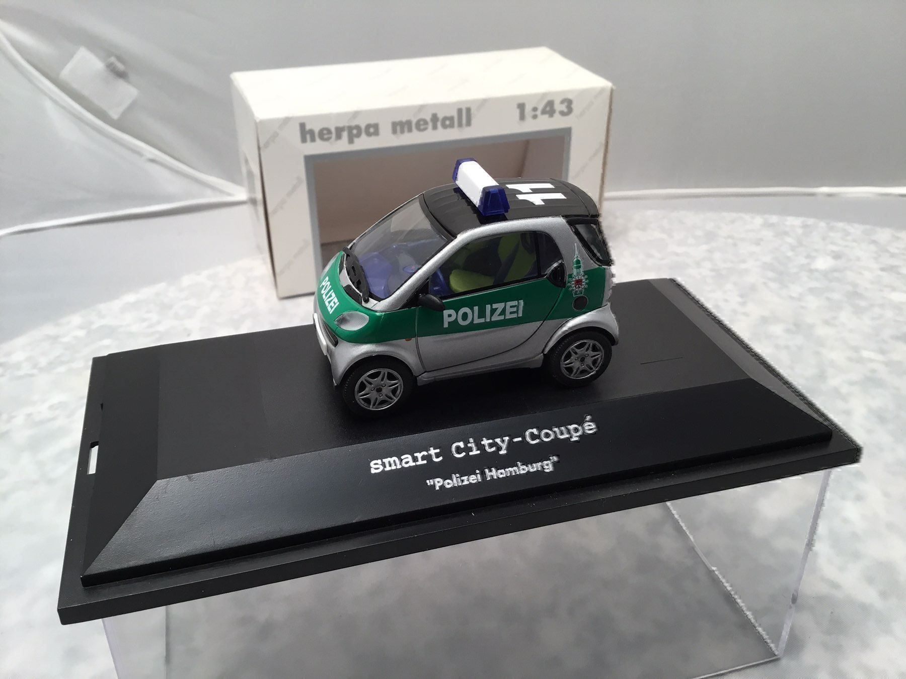 Smart Modellini d'auto: Polizei SMART – Nuovo e nell'imballaggio originale da Erlenbach im Simmental venduto da Model_box 7