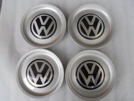 A vendre 4 caches moyeu pour jantes vw