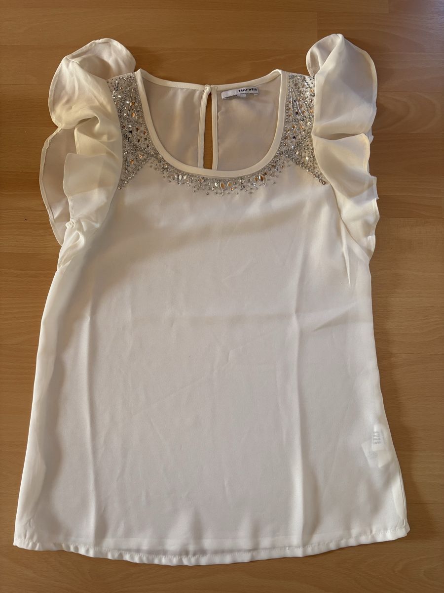 Top: Haut blanc crème avec brillants – Nuovo (secondo la descrizione) da Courcelon venduto da odi_9mjv
