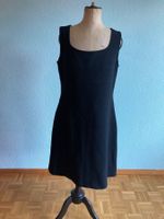 Superbe robe en laine noire T42