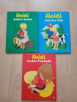 Heidi Bücher "kehrt heim", "auf der Alp", "in der Fremde"