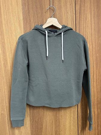 grüner Kapuzenpullover