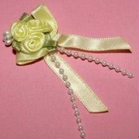Noeud triple roses + perles JAUNE