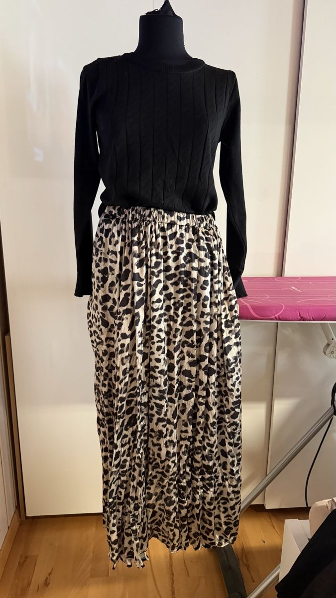 Lotti di vestiti: Rock mit Leopardenmuster&schwarzer Pulli gr M – Usato da Haslen GL venduto da rana04