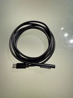 Surface cable charger