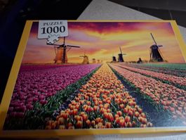 Puzzle 1000 Teile Tulpenfeld mit Windmühlen Sonnenuntergang